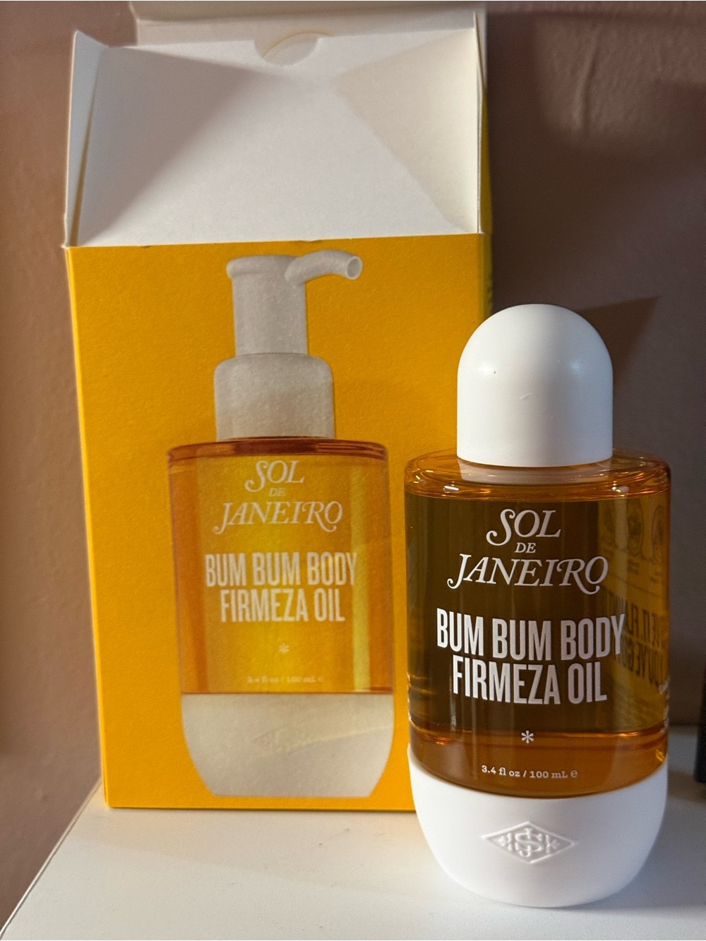 Sol de Janeiro Bum Bum Body Firmeza Oil — Orange and White Pump Bottle - Picture 4 of 5
